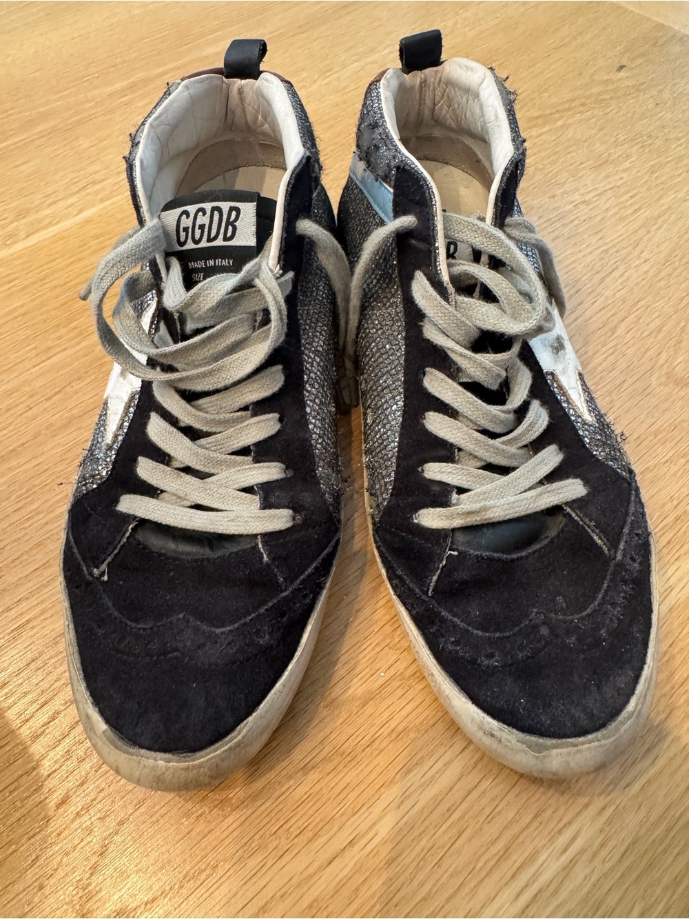 Golden Goose black suede sneakers with silver glitter accents